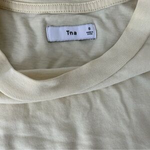 pastel yellow TNA cropped long sleeves shirt